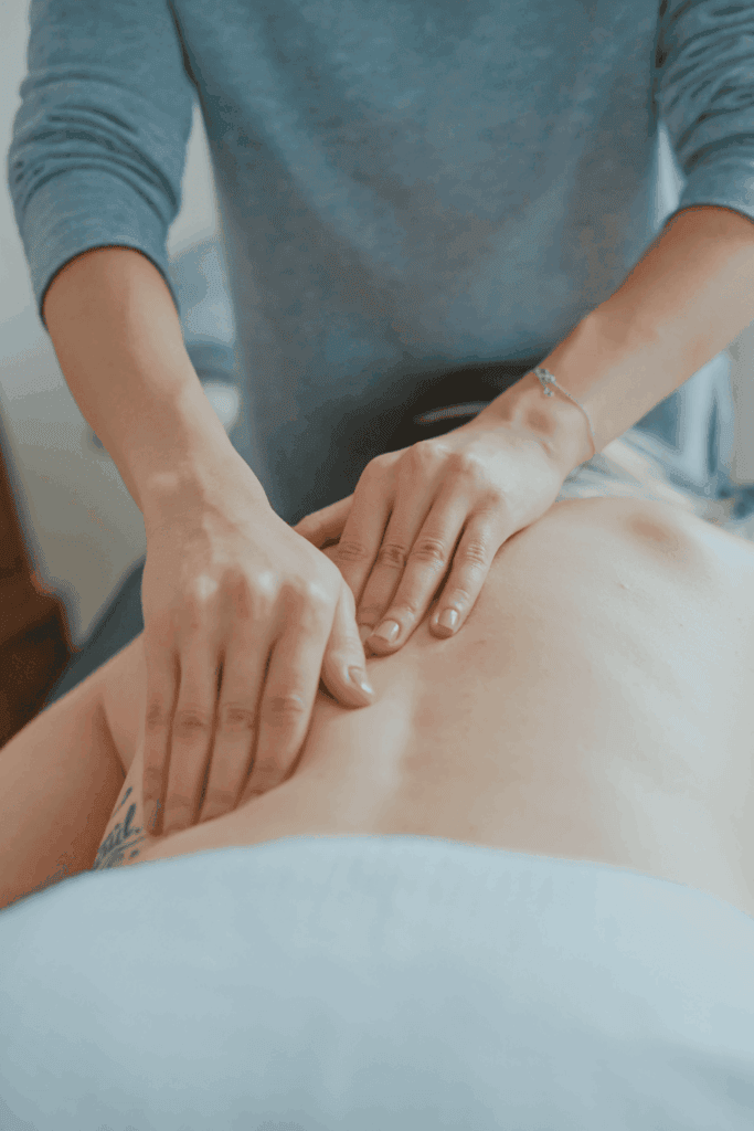 Practitioner providing hands-on Perrin Technique treatment